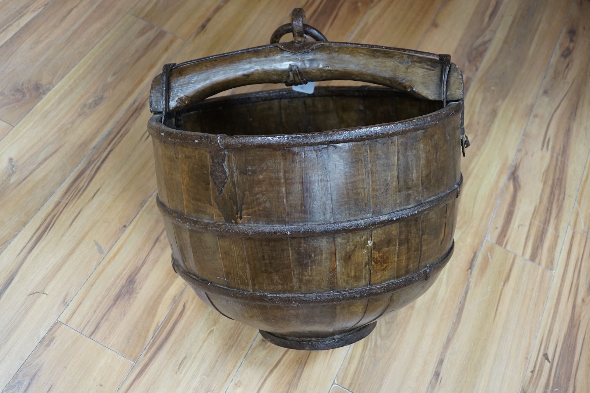 A Chinese coopered well bucket, 60cm high. Condition- fair to good